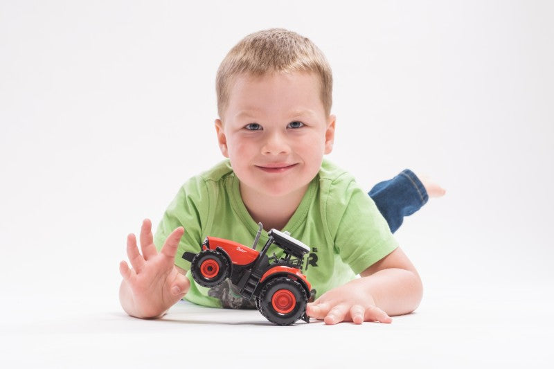 Traktor Zetor plast 9x14cm na setrvačník