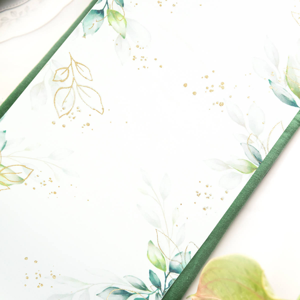 Leaf table runner with a gold floral motif, 275 x 28cm