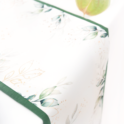 Leaf table runner with a gold floral motif, 275 x 28cm
