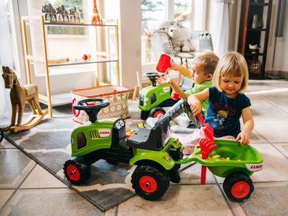Odstrkovadlo traktor Claas zelené s volantem a valníkem