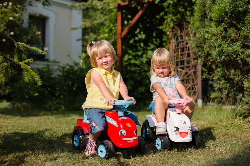 Odstrkovadlo - traktor Go Farm červené s volantem a valníkem