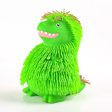 Žertovinka mačkací 25 cm dinosaurus