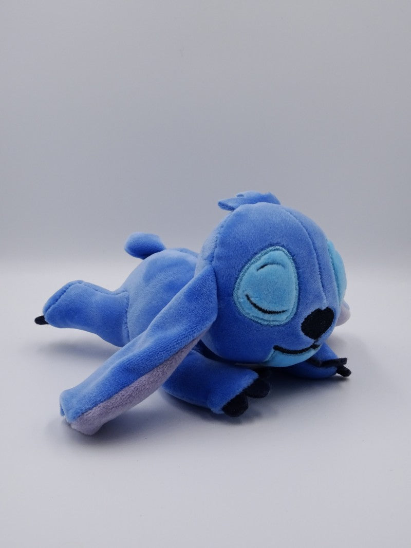 Plyšová figurka s klipem v sáčku Disney Snuglets 15 cm
